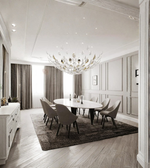 Modern dining room with a chandelier, table, and chairs.