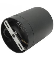 Black cylindrical object with internal components on a white background