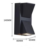 Black outdoor wall light with dimensions indicated on a white background