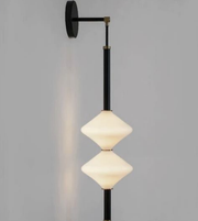 Modern wall lamp with geometric design on a gray background
