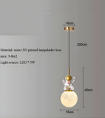 Pendant light with dimensions and material details on a gray background
