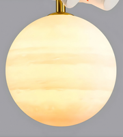 Spherical light bulb with a gradient from yellow to white on a gray background