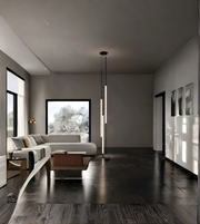 Modern living room with a large window, gray walls, and a white sofa.