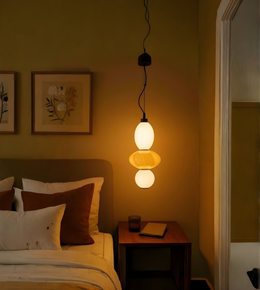 Aurora Trio glass pendant light by Daya Worldwide hanging in a modern living space, featuring clear glass shades and sleek design.