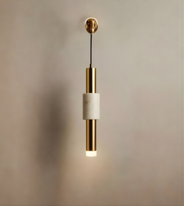 Pendant light with gold and white design on a neutral background