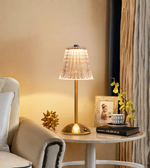 Gold crystal lamp styled on side table in living room