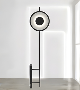 Modern circular LED floor lamp with black metal frame in minimalist interior