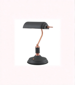 Matte black banker desk lamp with copper accents on white background
