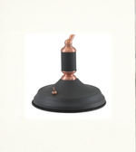 Close-up of black metal shade with copper detailing on banker lamp