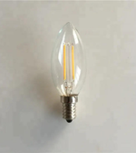 Clear LED light bulb on a plain background