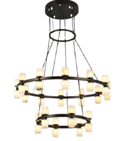Modern chandelier with multiple light bulbs on a white background