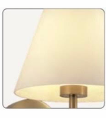 Decorative wall light fixture with beige lampshade and gold base.