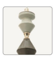 Decorative candle holder with gold accents on a white background