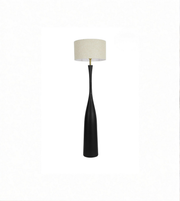 Floor lamp with a black base and beige shade on a white background