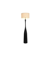 Floor lamp with a black base and beige shade on a white background