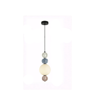 Pendant light with colorful spherical shades on a white background