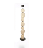 Decorative floor lamp with stacked stone-like design on a white background