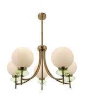 Chandelier with brass fixture and white and green glass shades on a white background