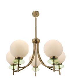 Chandelier with brass fixture and white and green glass shades on a white background