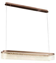 Modern pendant light with rectangular shade and bronze finish on a white background