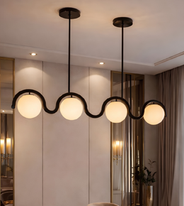 Modern chandelier with glass shades in a room setting
