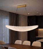 Modern ceiling light fixture in a dining room setting