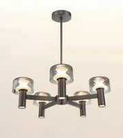 A modern 5-light chandelier with a dark brushed metal frame and clear cylindrical glass shades, shown against a plain off-white background.