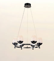 A modern 5-light chandelier with a glossy black circular metal frame, textured white glass shades, and a black ceiling canopy, shown against a plain light beige background.