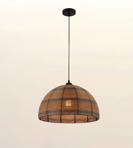 A dome-shaped pendant light with a woven natural rattan shade and black metal frame, suspended by a black cord from a black ceiling canopy against a plain off-white background.
