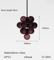 Purple spherical pendant light with dimensions and material details on a white background