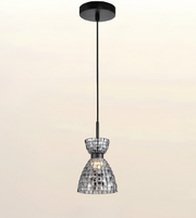 A modern pendant light with a black ceiling canopy and cord, featuring a clear glass shade covered in small reflective silver tiles, shown against a plain light beige background.