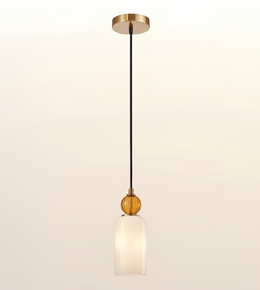 A modern single-light pendant lamp with a black cord, gold-toned metal canopy and decorative accents, and a frosted white glass shade, shown against a plain light background.