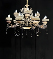 Decorative chandelier with crystal accents on a black background