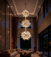 Luxurious interior with large chandeliers hanging from the ceiling.