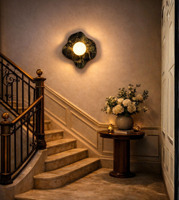 Modern green stone wall light installed in elegant staircase interior with warm ambient glow