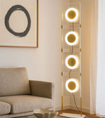 Modern LED ring floor lamp with circular lights in contemporary living room
