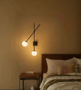 Adjustable double globe wall sconce with modern black metal frame