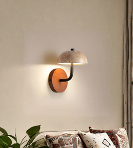 Natural material wall light in cozy bedroom setting