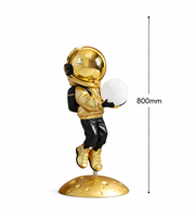 Daya Worldwide Astro Glow sculptural floor lamp in the shape of a modern statue, featuring a sleek, artistic design with a glowing finish.