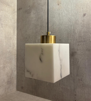 Modern marble effect pendant light by Daya Worldwide, featuring a sleek design with a marble-inspired finish and hanging pendant style.