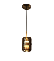 Modern smoked and amber glass cylinder pendant light by Daya Worldwide, showcasing a sleek, stylish lighting fixture.