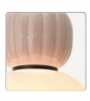 Ceramic bowl with ribbed texture on a white background