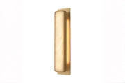 Minimalist linear wall sconce with metallic frame on white background