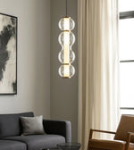 Daya Worldwide Radiant Glow pendant light hanging from ceiling, modern decor with warm ambient illumination.