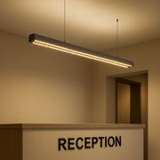 Reception area with a modern light fixture on the ceiling.