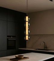 Pendant light from Daya Worldwide's RADIANT GLOW collection, featuring a sleek, modern design with warm illumination.