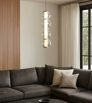 Daya Worldwide Radiant Glow pendant light hanging from ceiling with warm illumination, modern design for stylish home lighting.