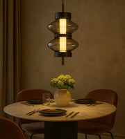 Daya Worldwide Ethereal Glow pendant light hanging from ceiling, modern design with warm ambient illumination in a stylish interior setting