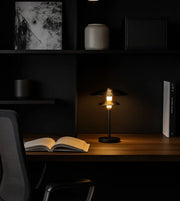 Daya Worldwide Zen Eclipse table lamp with a sleek modern design and soft lighting, perfect for living room or bedroom decor.