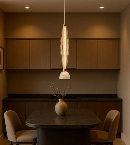 Pendant light from Daya Worldwide's LUCENT WAVE collection, featuring a sleek, wave-shaped design in a modern lighting fixture.